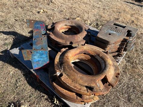 Tractor Suitcase Weights For Sale, Pros: Ballast can be added or removed,  though not as easily as a slip on suitcase weight.