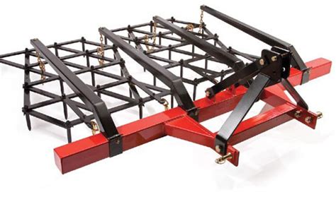 Tractor drag harrow.  They help with soil preparation, weed control, see...
