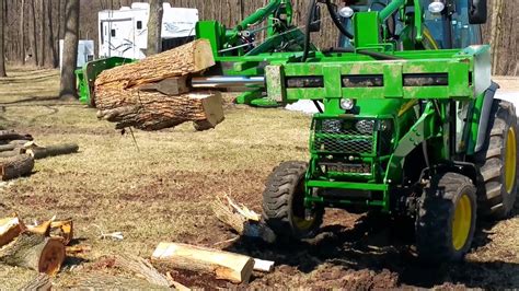 Tractor mounted wood splitter - YouTube