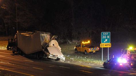 A 37-year-old tractor-trailer driver is facing charges after he allegedly fled the scene following an early-morning crash on the Southern State Parkway that sent two people to the hospital .... 