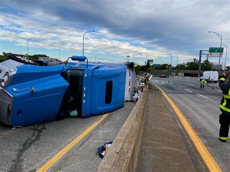 Tractor-trailer rollover spills garbage, closing Mass Pike/I-495 ramp in Hopkinton for hours