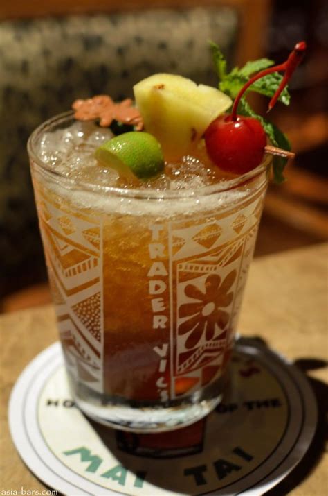Trader vics mai tai. Aug 11, 2020 · Trader Vic’s 1944 Mai Tai. Fresh press lime and discard spent shell into bucket or double old fashioned glass. Add syrups, orgeat and liquors to shaker tin. Fill with ice, shake briskly and strain over crushed ice if available. Garnish with spent lime shell, bouquet of fresh mint, freshly grated nutmeg (optional). 