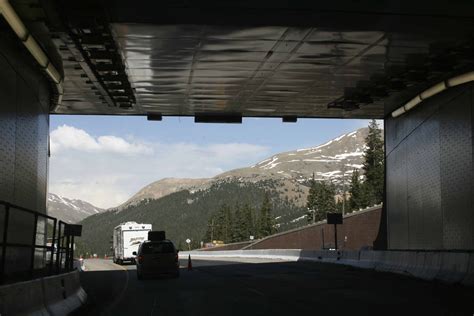 The Eisenhower Tunnel is noted as both the longest mountain tunnel and the highest point on the Interstate Highway System. The tunnel has a command center, staffed with 52 full-time employees, to monitor traffic, remove stranded vehicles, and maintain generators to keep the tunnel's lighting and ventilation systems running in the event of a .... 
