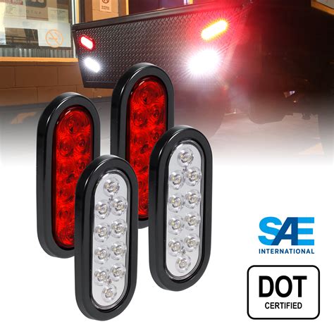 9-1/2" x 4" Oval LED trailer light works as a stop, turn, tail, and license plate light for driver side applications-- Includes rear reflex reflector and license plate mounting bracket . Left hand driver's side:36 Diodes(30Red+3 White license plate light+3 White reverse light) Right hand Passenger's Side: 33 Diodes(30Red+3 White reverse light). 