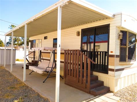 This unit is Pet friendly with an additional $250.00 pet deposit if applicable. This rental unit is a 8ft x 24ft park trailer. It is a very cozy unit with a queen bed, bathroom and shower, kitchen / dining area. Nice deck with a BBQ grill. This unit rental price is $900.00 per month plus propane and electric..