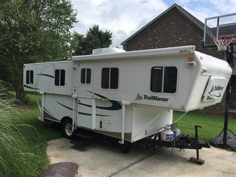 Trailmanor 2619 for sale. 2010 Trail Manor 2619 folding pop up expandable travel trailer. 19 footer at 2991 lbs is an easy tow for lots of vehicles. Nice condition inside and out! Call Tom's Camperland On … 