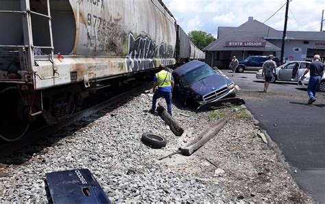 Train accident eaton ohio. Apr 1, 2016 ... In Wednesday's tragedy, the 9,000-foot-long train stopped after the incident, blocking a two-mile stretch of the street/railroad crossings ... 