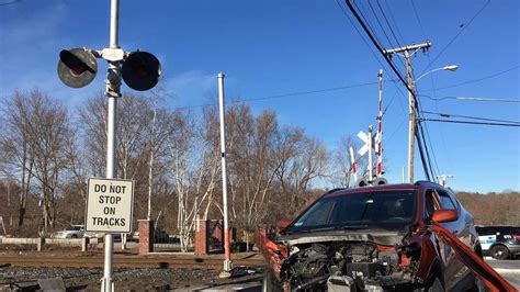 Train and car collide in Andover