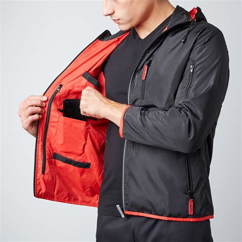 Travel jacket. Lightweight and easy to pack, this jacket is streamlined for absolute comfort. The recycled stretch nylon construction features a high collar and a zip ... 