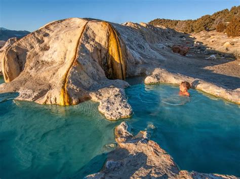 Travertine hot springs. Travertine is a terrestrial sedimentary rock, formed by the precipitation of carbonate minerals from solution in ground and surface waters, and/or geothermally heated hot-springs. … 
