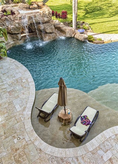 Travertine pool deck. May 16, 2019 · List of the Pros of a Travertine Pool Deck. 1. It handles changes in temperature exceptionally well. Travertine is an ideal surface to consider for outdoor landscaping and as a floor tile for your pool deck because it is so resistant to temperature extremes. 