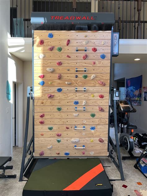 Treadwall for sale. Holds: Set of 45 custom training holds in 3 color groups, with. optional 14 ladder Line (tm) holds. Maximum Hold Size: 2.5 inches high by 6 inches wide. Floor Mat Provided: 8 feet x 6 feet custom mat, 1.25 inches dual foam, black 14 oz. vinyl cover. Warranty: Six years parts, one year electronics and labour. 