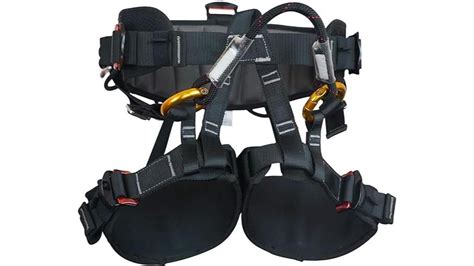 Tree climbing harness kit. 32 standard, which covers personal protective...