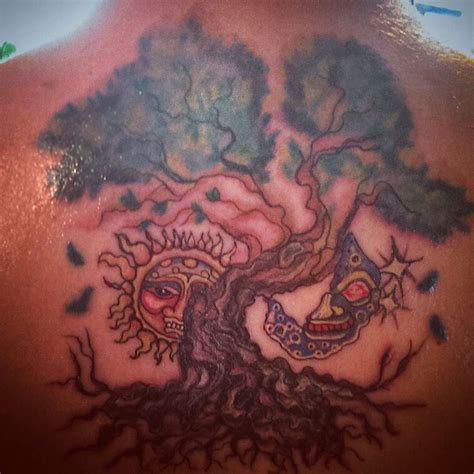 Tree of Life with sublime sun & evil moon tattoo. Tree of life tattoo