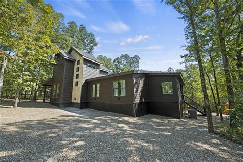 4 Bedrooms • 4 Bathrooms • Sleeps 6-12. Amenities – Internet Fireplace Forest Hot Tub (more...) Welcome to Heavenly Hideaway! This beautiful 3 king bedrooms all with on-suites + queen bed loft with on-suite, can accommodate up to 12 guests. This cabin was recently voted NEW CABIN OF THE MONTH by Broken Bow Inv.. 