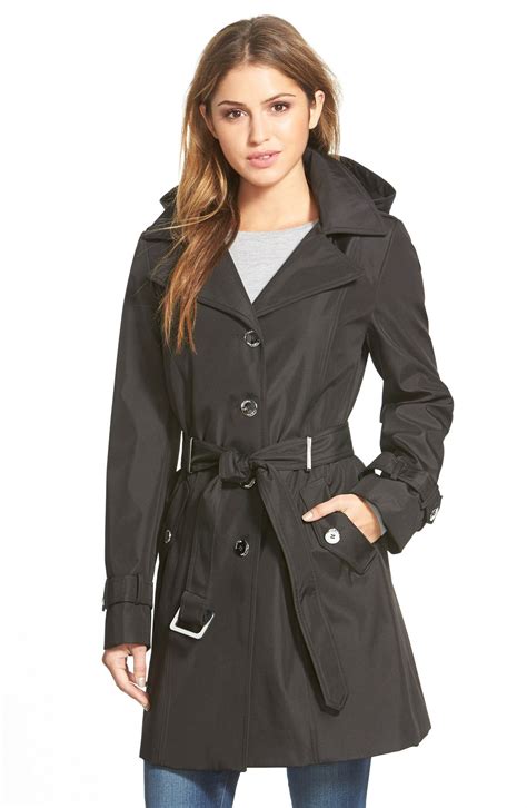 Trench coats for petites. Trench coats and springtime weather go hand in hand. So show off your legs with a dress and skirt and layer the look with a classic trench coat. Petite girls should really make sure the length of the dress hem and the length of the trench coat are relatively similar. 