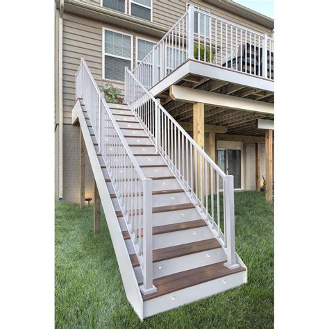 Trex enhance 8 ft stair railing kit. Saddle. Collection Kit Includes: 1 Composite Post Sleeve*, 1 Composite Post Cap*, 1 Composite Post Skirt*, 1 Railing Kit (top/bottom rails, round aluminum balusters, adjustable foot block, hardware). * The Enhance Railing Collection Kit is designed for and includes all materials necessary to attach one end of a railing section to a standing ... 