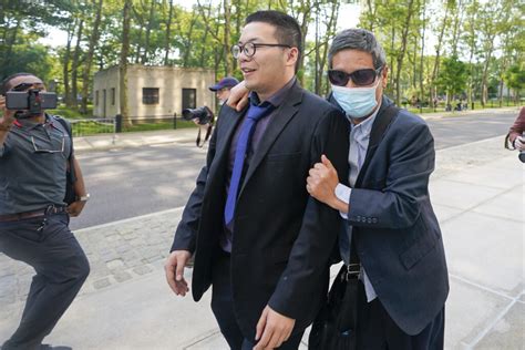 Trial opens for 3 charged with aiding Chinese campaign to pressure expats into returning home