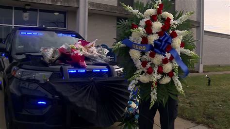 Tributes pour in as community mourns police officer, utility worker killed in Waltham crash