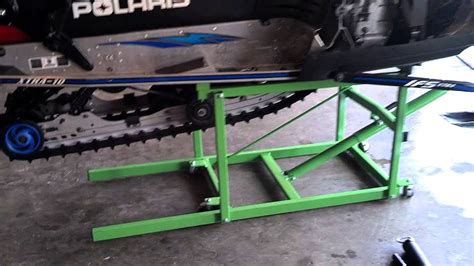 Looking for a Snowmobile lift? Contact Brain 612-987-8025 @ Wests