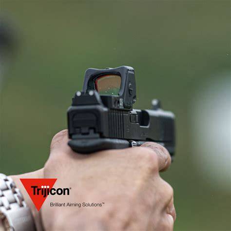 Trijicon rmr red dot.  No slide milling or permanent modifications required.  Trijic...