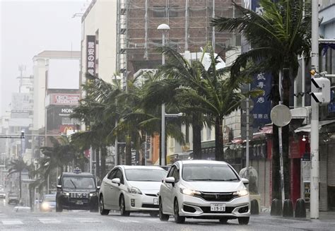 Tropical storm hits Japan’s Okinawa islands again, unleashing torrential rain