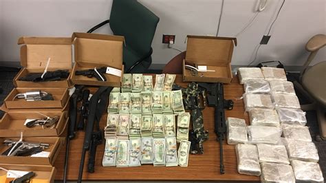 Troy Police seize illegal firearms and drugs