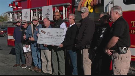 Troy firefighters present Tunnel to Towers with $48K check