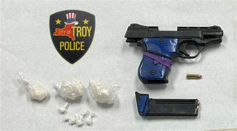 Troy man arrested for possessing cocaine, illegal gun