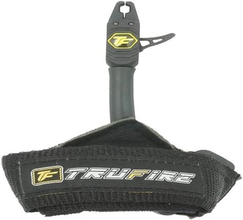 Tru fire release. TRU-FIRE FOLDBACK . The patented Tru-Fire Foldback Ring design allows the release’s head to be flipped back 180-degrees with ease. The head stays held in position against the buckle strap and tight to the archer’s arm to prevent the head from hitting anything while moving around the stand. 