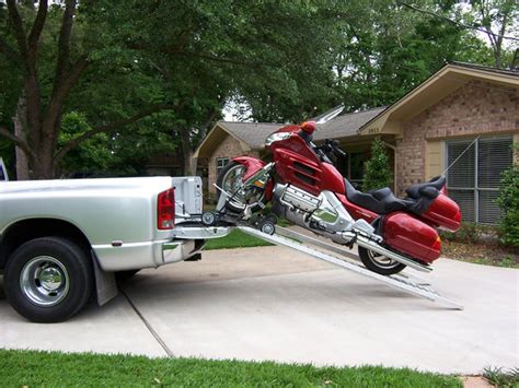 The Motorcycle Loader allows for storage and still allows you to pull a boat or trailer. The unique configuration fits into most full-size or mid-size pick up truck beds and has the ability to be installed in 6' + short bed pickups with proper load rating. 4' AND 5' TRUCK BED LOADERS AVAILABLE WITH "LOAD BEARING RECEIVER HITCH DOLLIES" TO ....