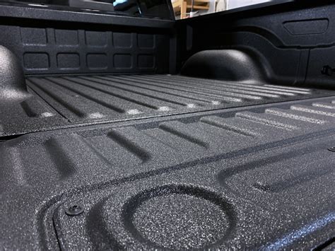 Truck bed spray liner cost. Appling directly to the bed’s surface to create an airtight protective barrier, a spray-in bed liner offers much better protection against scratches, dents, and corrosion when compared to a typical drop-in removable bed liner. Spray-In Bed Liners also provide a clean, custom fit allowing you full use of your trucks bed, unlike bulky drop-in ... 