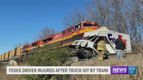 Truck hit by train in Silver Spring