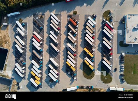 Truck parking lot. According to Nolo, determining the right of way in a parking lot depends on the situation. If a car is backing out of a parking space and hits a car driving down the parking lane, ... 