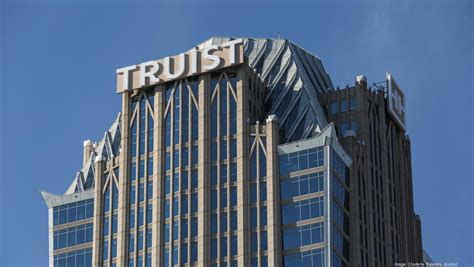 Truist bank office. Truist is a purpose-driven financial services company, formed by the historic merger of equals of BB&T and SunTrust. We serve clients in a number of high-growth markets in the country, offering a wide range of financial services. This includes: We're a top 10 U.S. commercial bank, headquartered in Charlotte, North Carolina. 