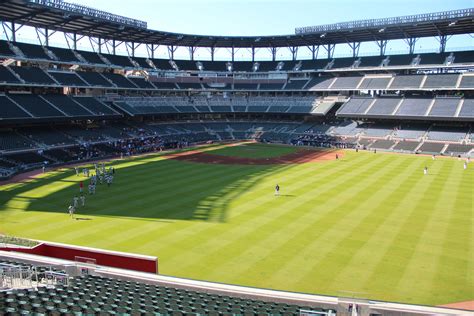 Truist Park offers covered seats across various levels, ensuring fans can enjoy the game comfortably regardless of the weather conditions. In the 100 level, rows 8 and above in sections 133-143 and 110-118 provide covered seating options. On the 200 level, rows 14 and above in sections 213-218 and 233-243 offer shelter from the elements. . 