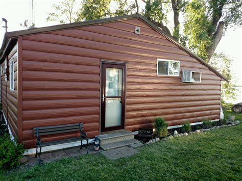 TruLog™ Siding is a company that offers metal paneling that mimics the look of log homes. It claims to save money and energy, and to be environmentally friendly and recyclable.. 