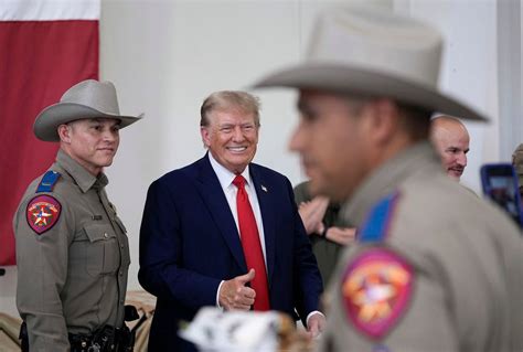 Trump picks up the endorsement of Texas Gov. Greg Abbott during a visit to a US-Mexico border town