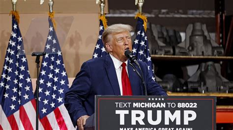 Trump rails against electric cars in Michigan while his GOP challengers debate