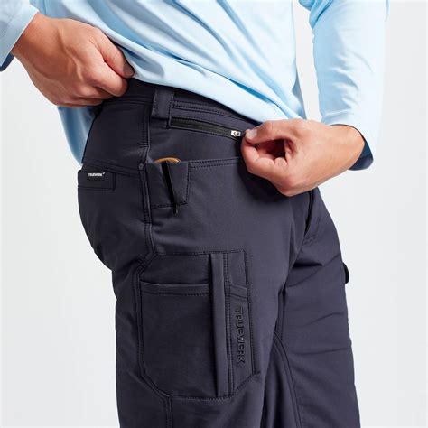 Truwerk. Designed with performance and comfort in mind, this robust aluminum D-ring buckle with 1.5” nylon webbing is durable enough to tackle years of hard work. Compatible with any TRUEWERK pants or shorts, the 53” length can be customized for a perfect fit. Keep your pants in place (no slippage here) with this bulk-free best-seller. 