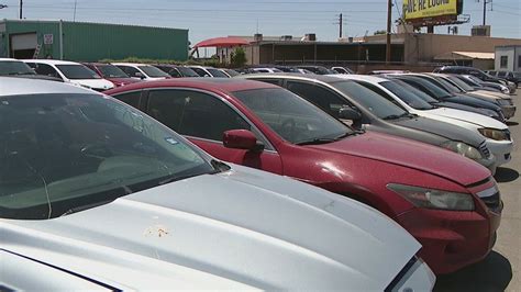 After months of investigation, police raided a suspected chop shop Tuesday, recovering 20 stolen vehicles and later arresting a Tucson man linked to the auto theft ring.. 