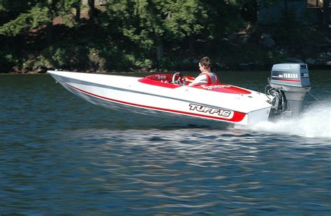 Tuff 16 boat. If you squint, the 16' looks very similar to its big brothers, with the low sleek lines and molded in wind fairing. Fully cored, and vacuum infused, the Tuff 16 is built like a serious performance boat. 16'10" overall and a narrow 63" beam make this a mini hot rod. What sets the Tuff apart is that it is truly a great design in a small ... 