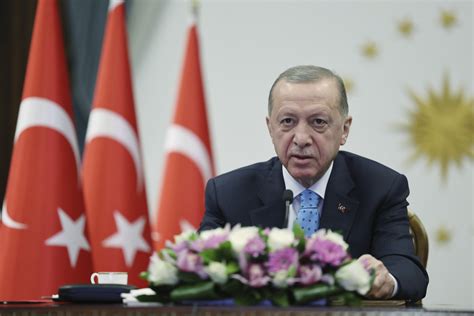 Turkey’s Erdogan appears via video link after health scare