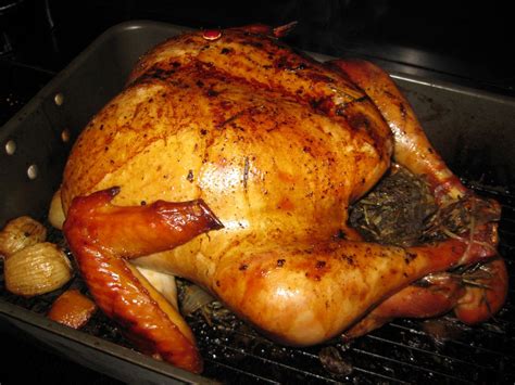 Preheat the oven to 275 degrees F. Remove the turkey from the brine and rinse thoroughly, inside and out. Soak the turkey in cold water for 15 minutes, then rinse again and pat dry. Truss the bird ... . 