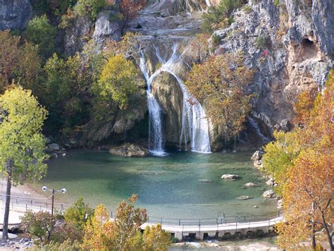 Turner falls oklahoma. Turner Falls is a waterfall on Honey Creek in the Arbuckle Mountains of south-central Oklahoma, United States, 6 miles (9.7 km) south of Davis.With a height of 77 feet (23 m), Turner Falls is locally considered Oklahoma's tallest waterfall, although its height matches one in Natural Falls State Park.. Turner Falls and the blue hole are dangerous and have … 