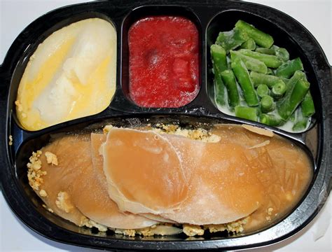 Tv dinner. Nov 19, 2016 · The first TV dinner featured the Thanksgiving classic trio: turkey, mashed potatoes, and peas. 1954. Image from Library of Commerce TV dinners go gourmet and appeal to consumer values. More menus were developed. Desserts (such as apple cobbler and brownies) were added in 1960, and breakfast options (like pancakes and sausage) … 