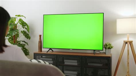 Tv green screen of death.  The common and easy solution is to reset the TV.  Sof...