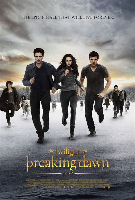 Twilight saga part 2 movie. Transformed, Bella (Kristen Stewart) stands alongside Edward (Robert Pattinson) as a vampire. 