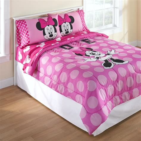 This comforter is soft, cozy, and plush. This comforter is part of the larger Minnie Mouse bedding collection here at Target. This item measures 86 inches long by 64 inches wide. It is machine washable and dryer safe. It is made of 100% polyester. Sheets and pillowcase sold separately.. 