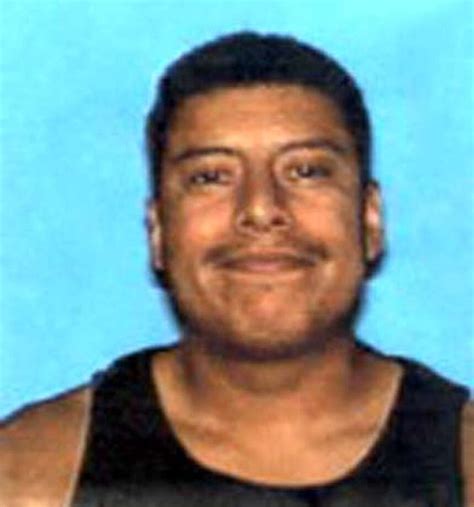 Two arrested in slaying of man found burning in rural Solano County